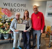 Presentation of Certificate to Booths Manager